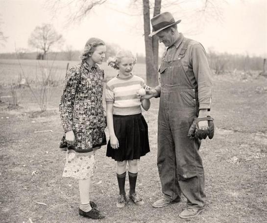 Farmer Playing with Children. It was created 1938