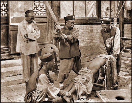 Chinese punishment, whipping a lawbreaker [c1900]